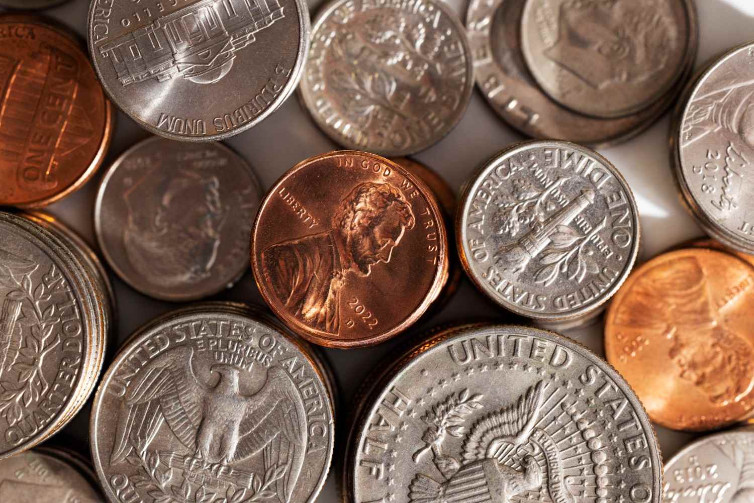 A close-up of a scattered pile of collectible coins
