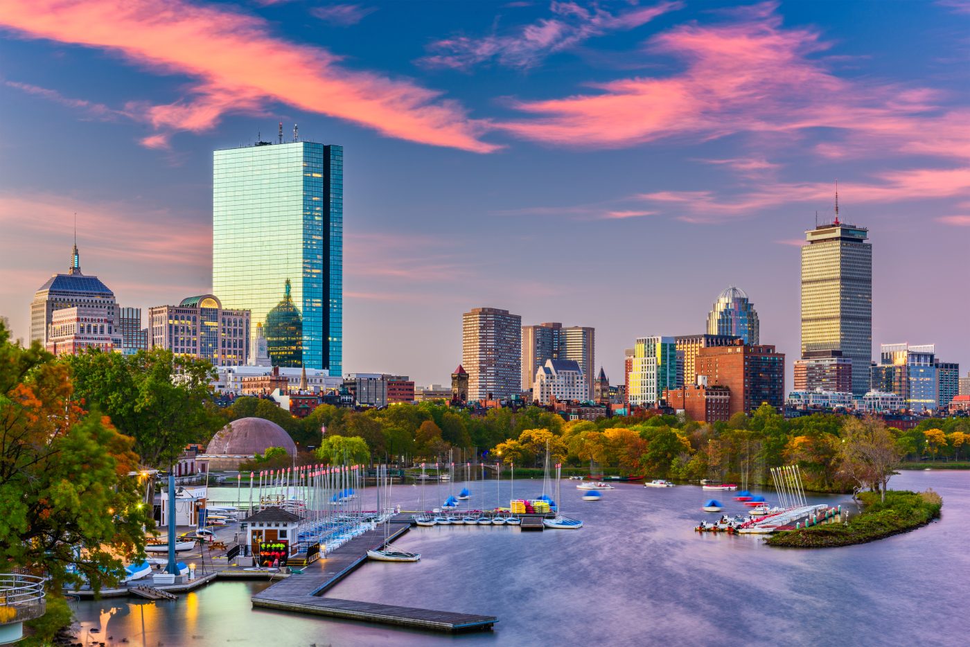 The Boston skyline along the Charles River at dusk