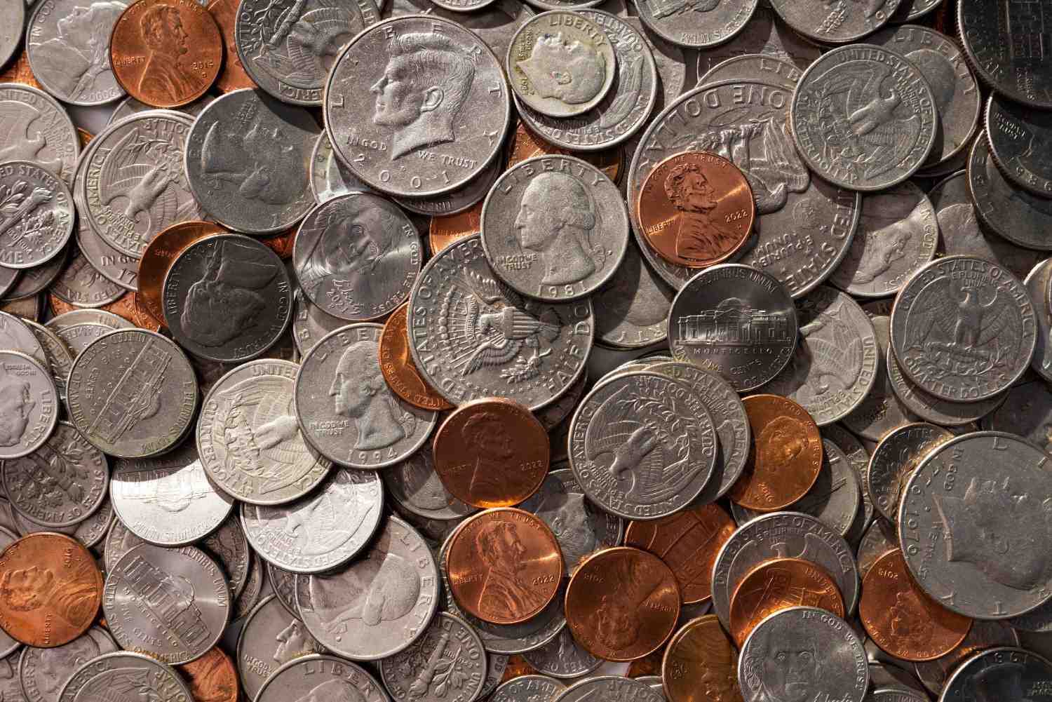 Storage boxes of coins and paper money from an estate collection