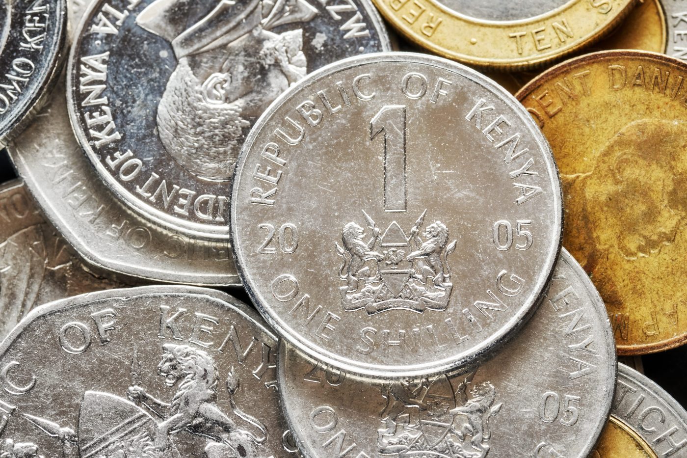 A close-up of gold and silver collectible coins