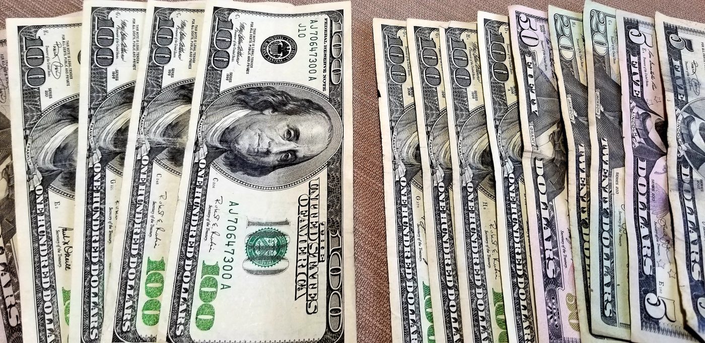 A collection of vintage U.S. paper currency fanned out