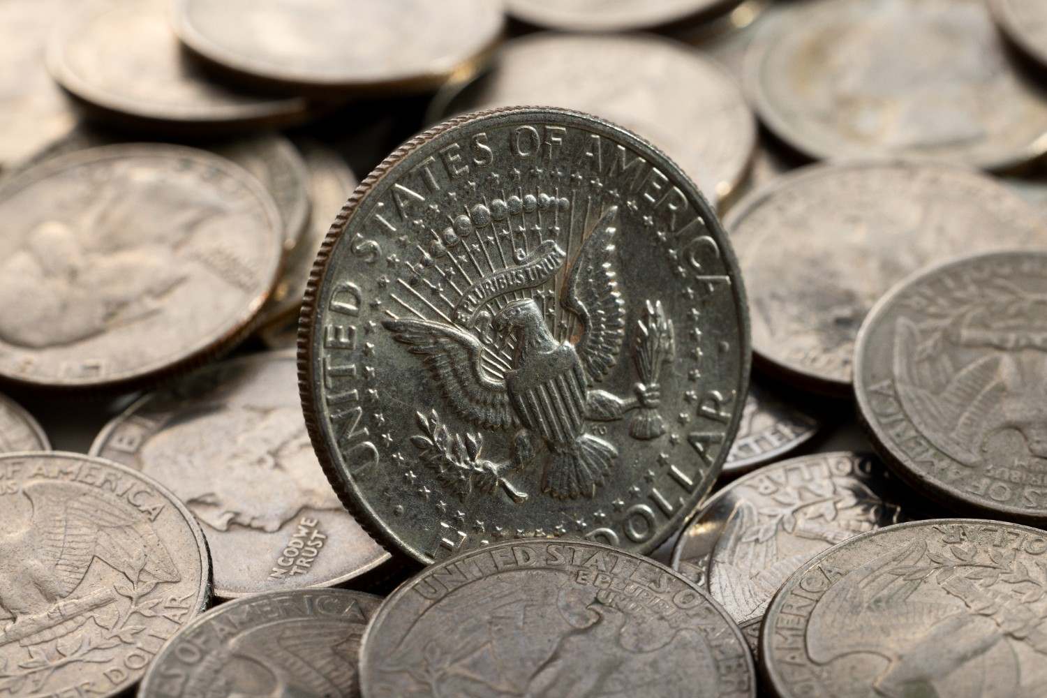 A close-up of Lincoln cents and Buffalo nickels